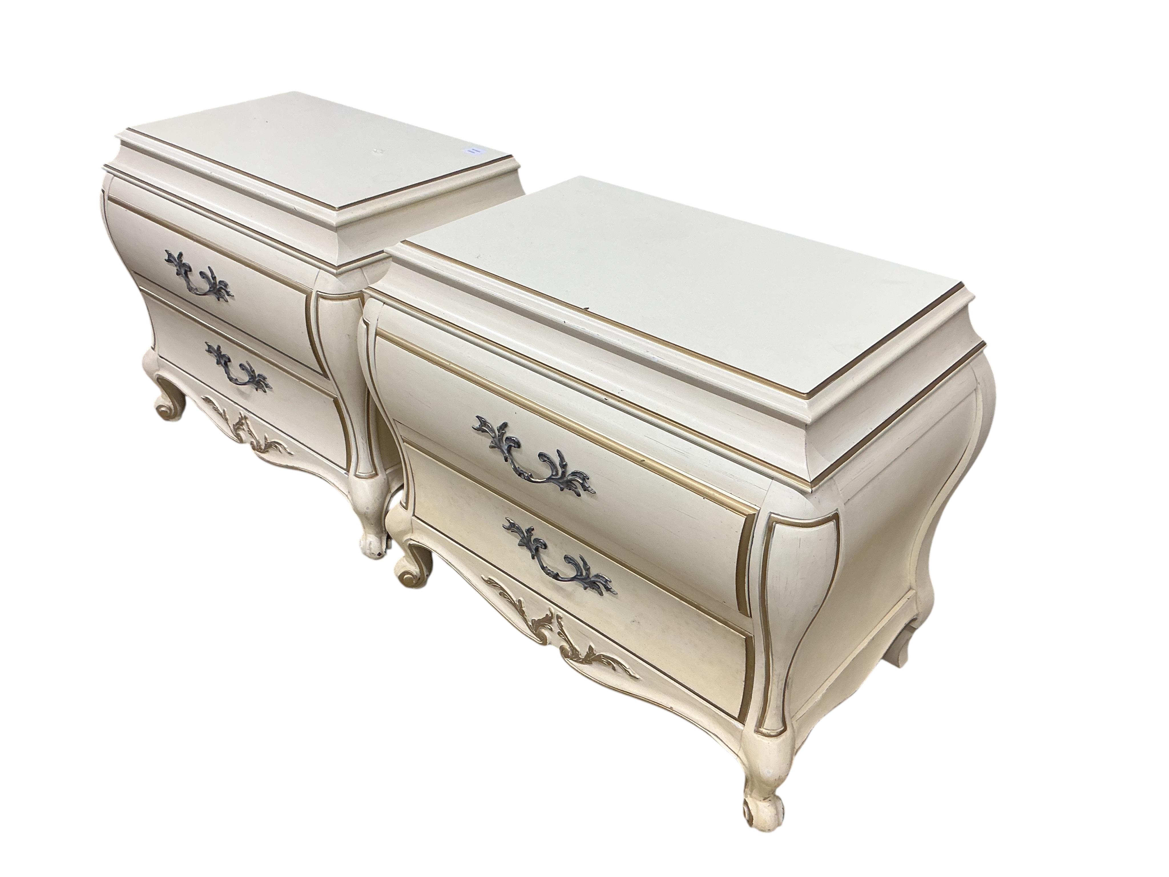 A pair of American cream and gilt painted bedside chests, width 80cm, depth 47cm, height 68cm